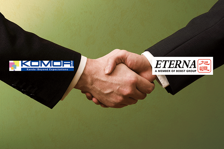 Komori Corporation and Shanghai Eternal Machinery logos